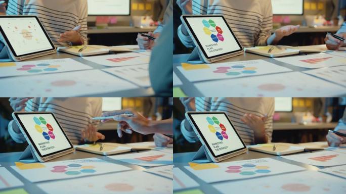 亚洲商人会议计划分析统计集思广益和团队标题保持平板电脑点图表，员工在现代家庭办公室之夜注意。
