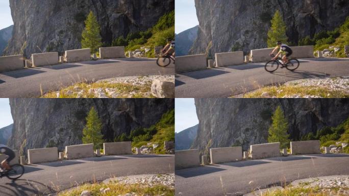 健康导向的公路自行车手在蜿蜒的山路上下坡，转弯