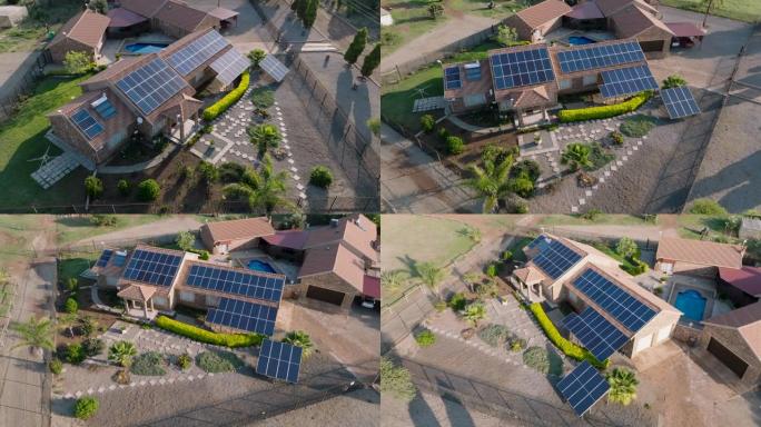 郊区房屋屋顶上带有光伏太阳能电池板的可更新节能房屋的特写圆形鸟瞰图