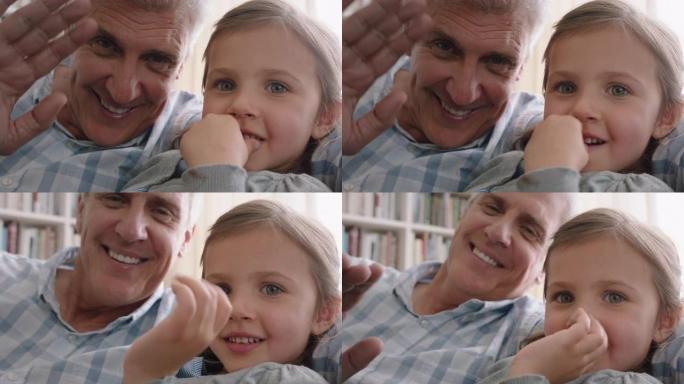 祖父和孩子有视频聊天小女孩与家人分享假期周末爷爷喜欢在家与孙女pov 4k在移动技术上聊天