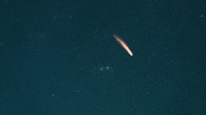 在波光粼粼的星空背景上落下的彗星。超失效