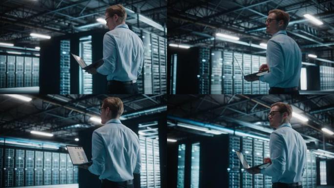 男性IT专家在数据中心使用平板电脑，走过大数据中心。云服务服务器，计算设施。成功的电子商务数字企业家