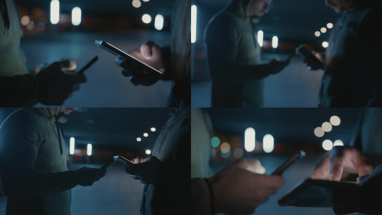 SLO MO蒙面男子在晚上使用智能手机