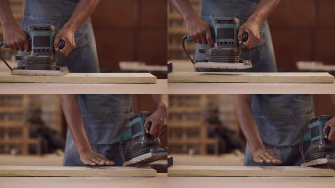 一名男木匠在工作中打磨一块木头的4k视频片段