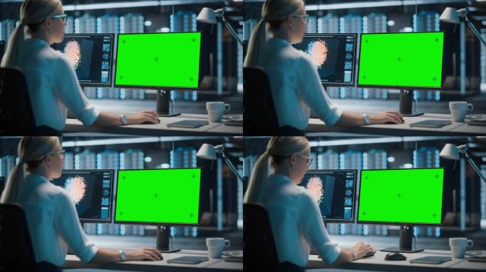 高科技数据中心服务器: 在绿屏色度关键计算机上工作的女性IT专家。监控网络服务、云计算、分析设施、维
