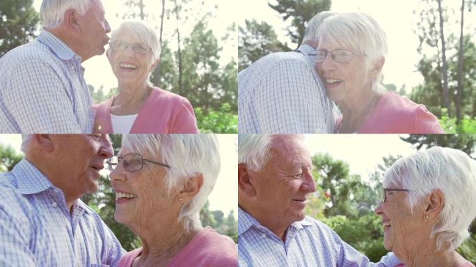 老年夫妇拥抱户外的慢动作序列