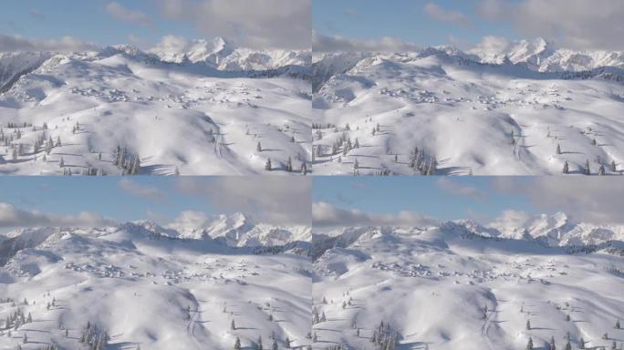 空中: 新鲜的积雪覆盖了Velika Planina的山脉和乡村景观。