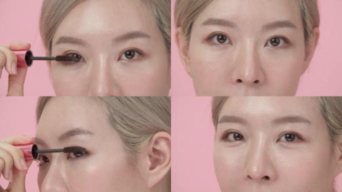 亚洲女性上半部脸的特写镜头，为睫毛涂睫毛膏。