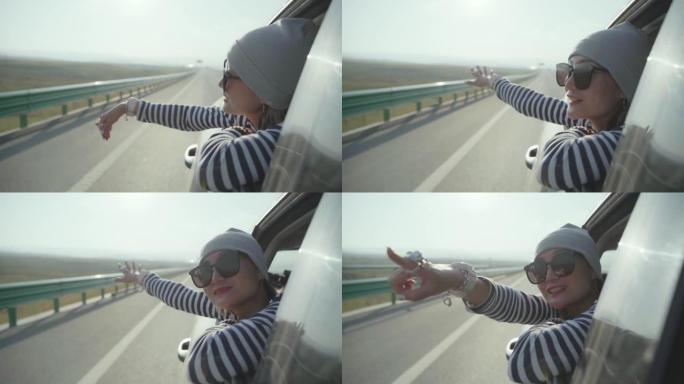 亚洲妇女在高速公路上开车旅行