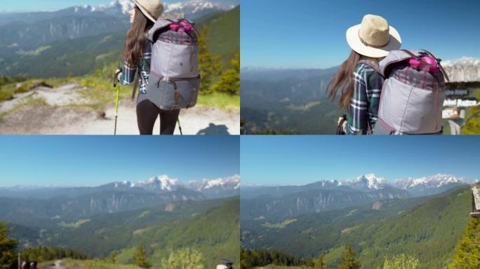 SLO MO年轻的女徒步旅行者走到山上的风景