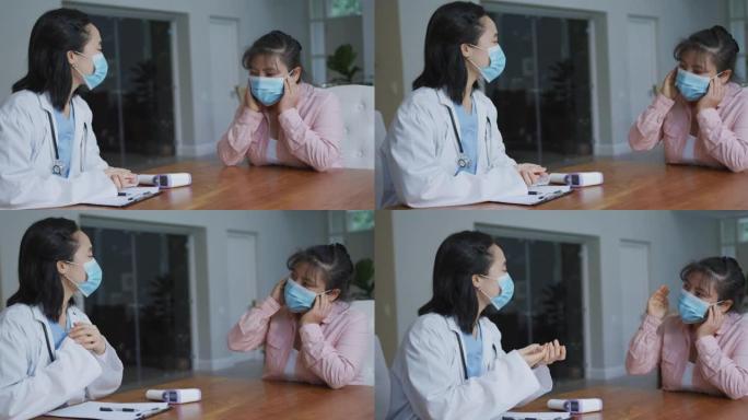 亚洲女护士戴口罩住院咨询女病人戴口罩