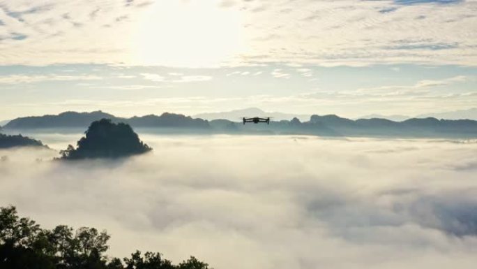 专业无人机在蓝天夕阳下低空飞行