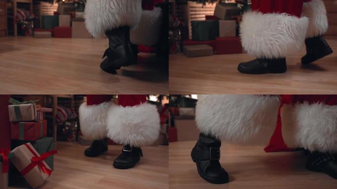圣诞老人穿着靴子的脚的特写镜头，他走在装满礼物的房子的木地板上，我们看到他是如何来到树上，然后坐在椅
