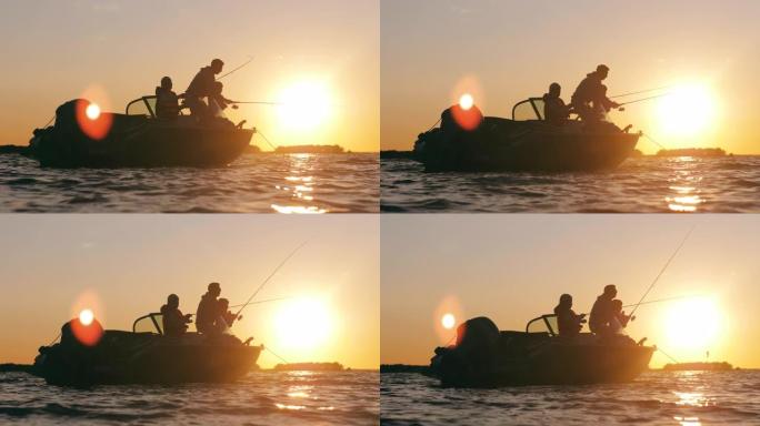 一个男人帮助他的儿子从摩托艇上抓鱼