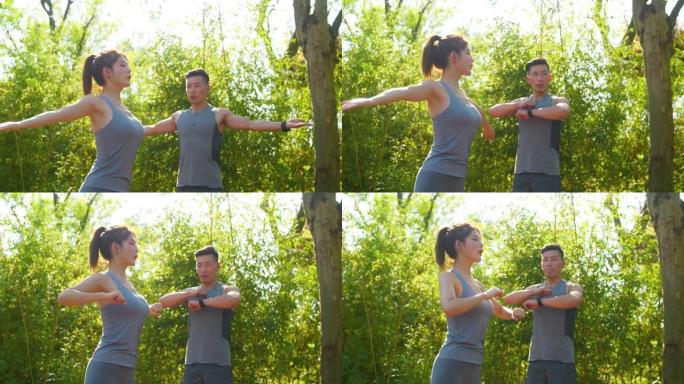 夫妇在公园里伸展户外瑜伽外国人健身运动