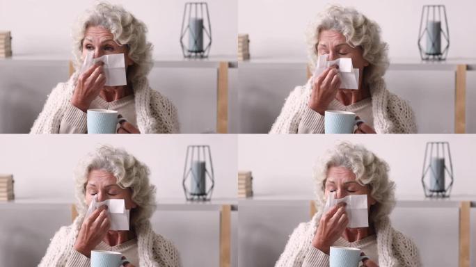 不健康的老年妇女使用纸巾。