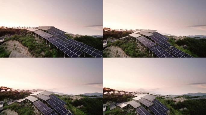 日落在山上的太阳能发电站