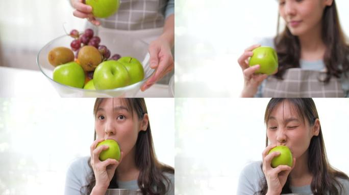 少妇咬青苹果，吃苹果