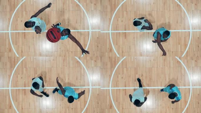 有两名非洲裔美国球员练习篮球的体育馆的俯视图