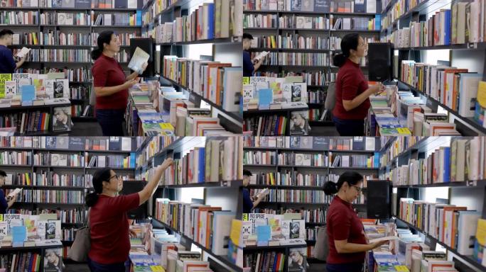 成熟的女人在书店里看书