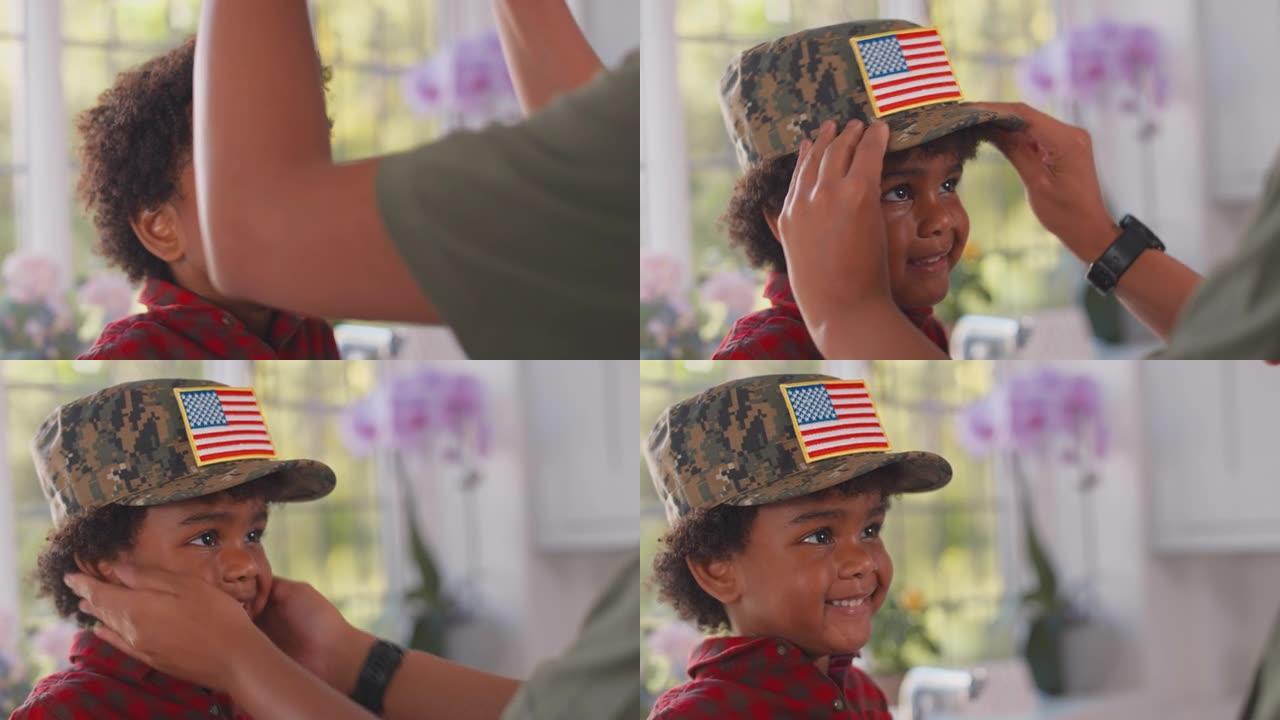 美军母亲回家休假，在厨房给儿子戴军帽的特写——慢镜头