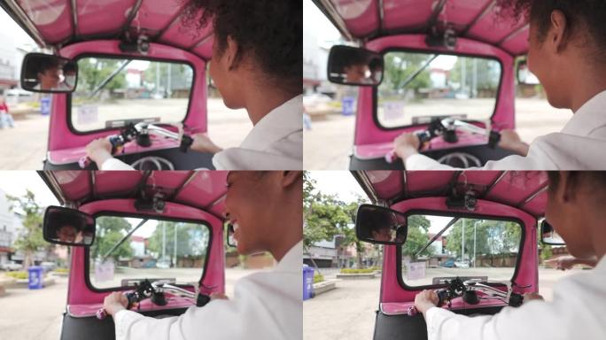 美丽的年轻女子正在学习驾驶电动汽车嘟嘟车