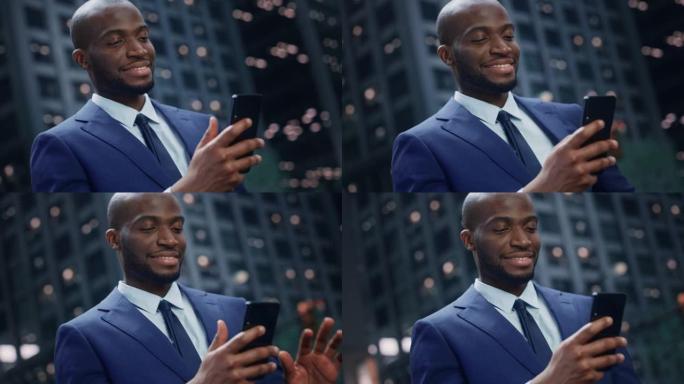 在大城市的街道上使用智能手机的成功非裔美国商人的肖像。微笑黑数字创业者用手机电商App做股市投资，网