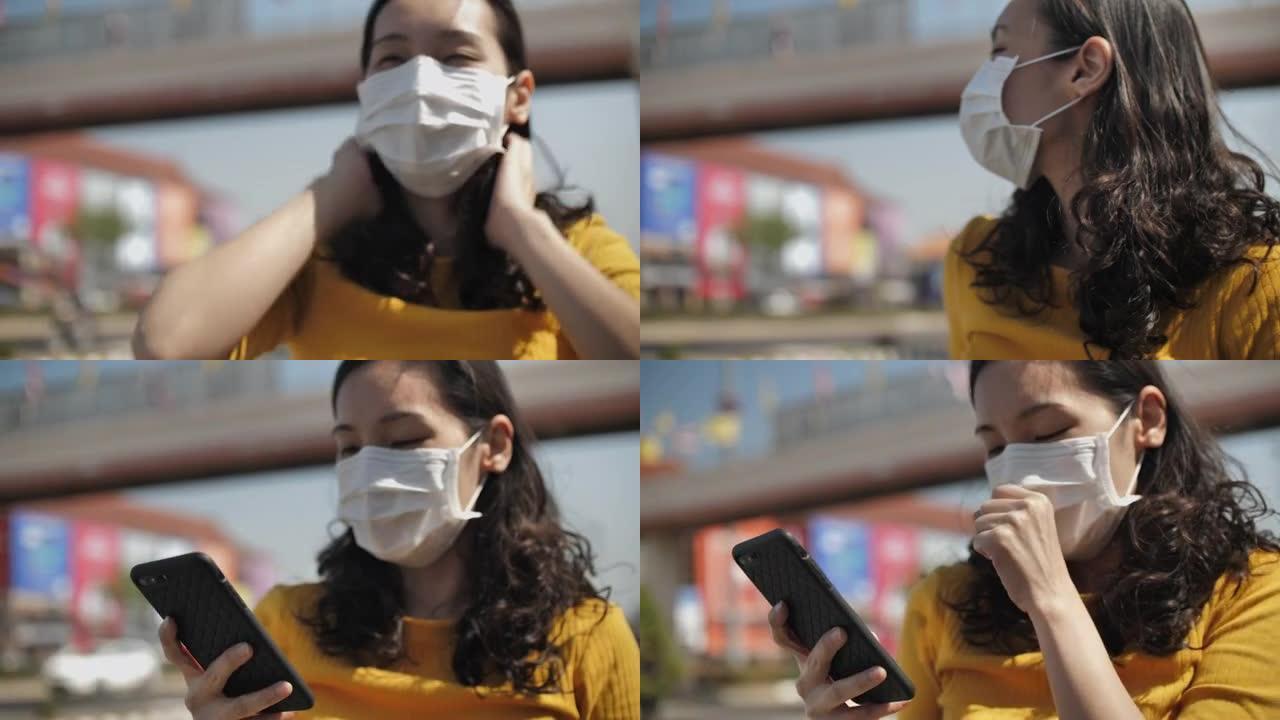 女人戴着鼻罩，以防止空气中PM 2.5灰尘和Covid病毒
