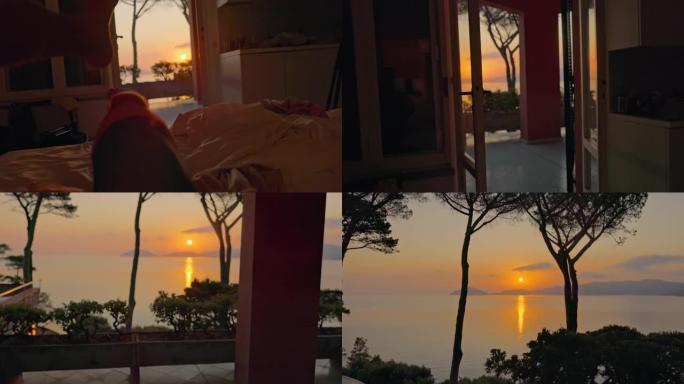 在意大利厄尔巴岛上观看日落的人的景色。