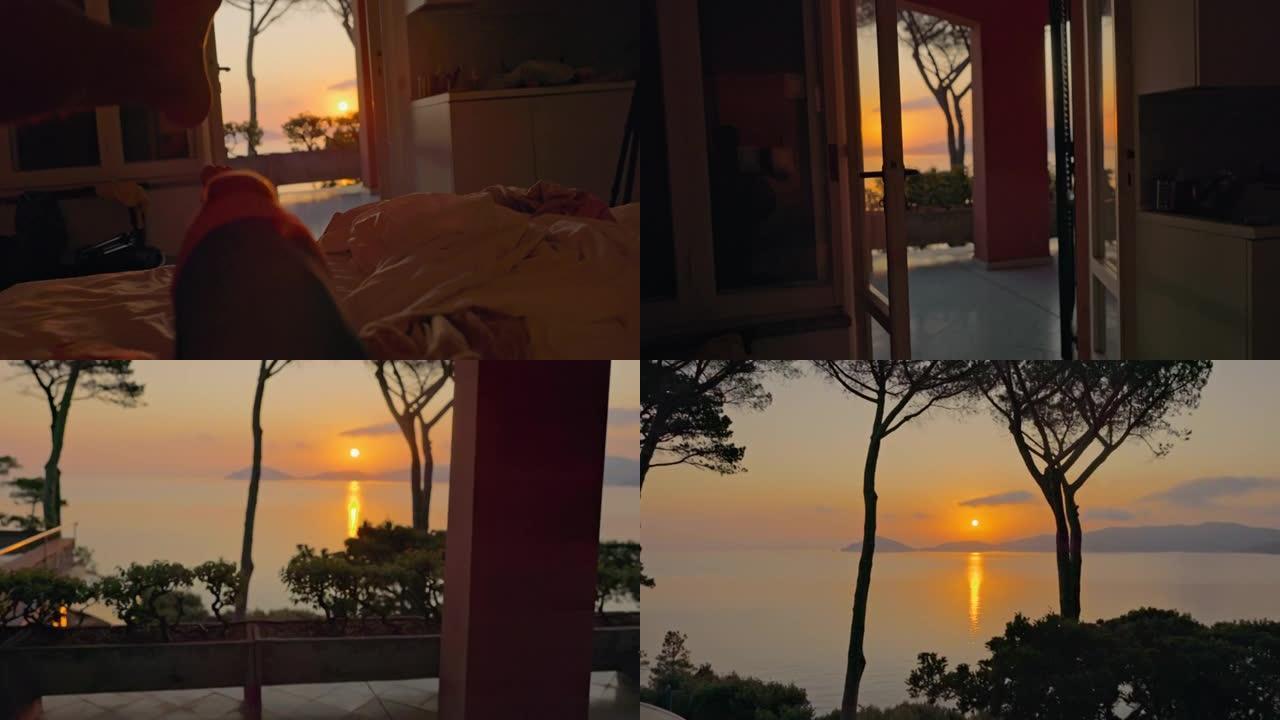 在意大利厄尔巴岛上观看日落的人的景色。