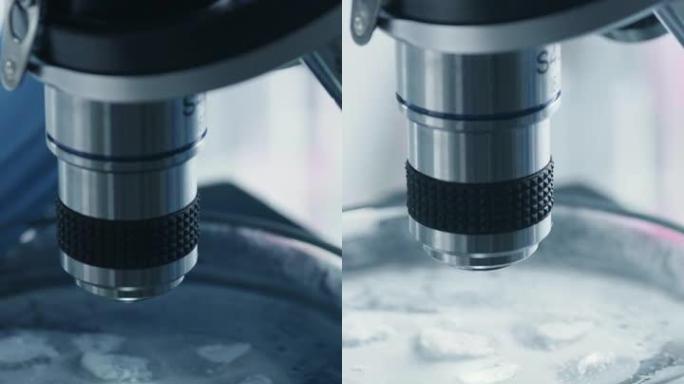 科学家将带有转基因样品的培养皿放在显微镜下的垂直特写镜头。微生物学家在现代实验室中从微量移液管向混合