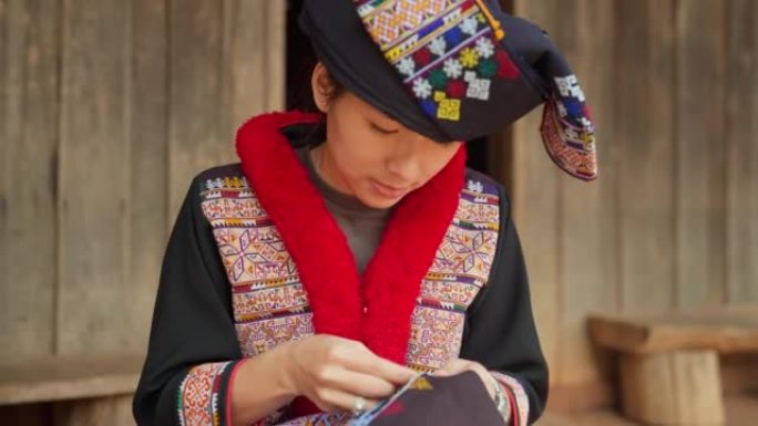 部落文化。少数民族民族服饰做手工