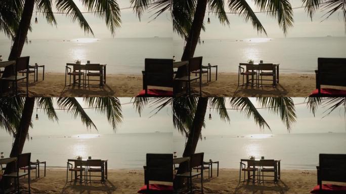 日落时海滩上的餐厅