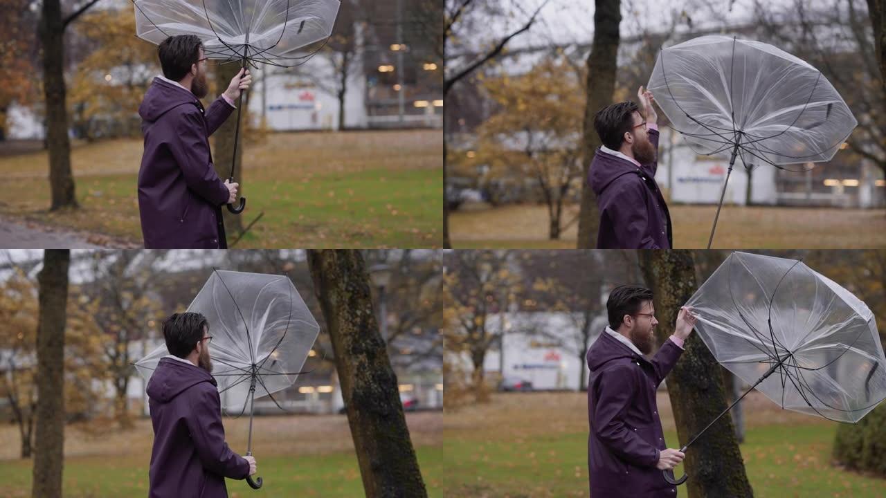 雨伞在风中折断
