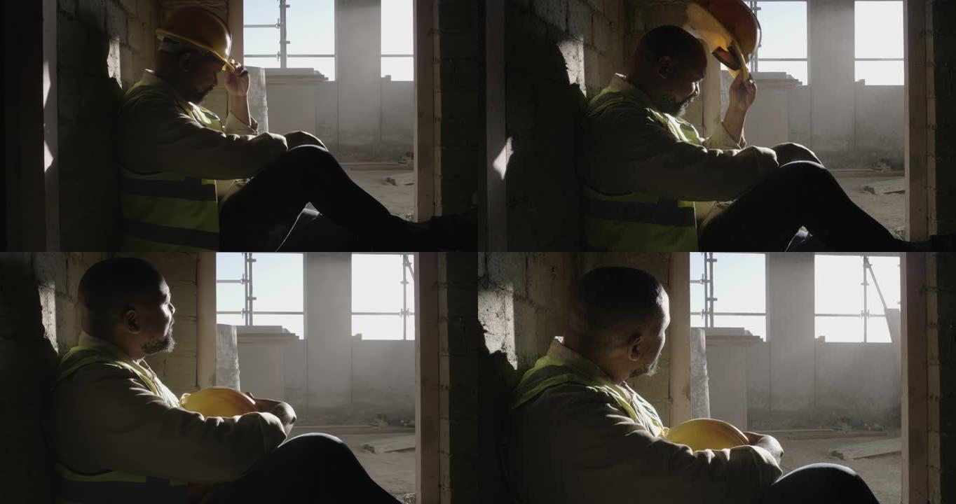 一名男子在建筑工地工作时休息的4k录像