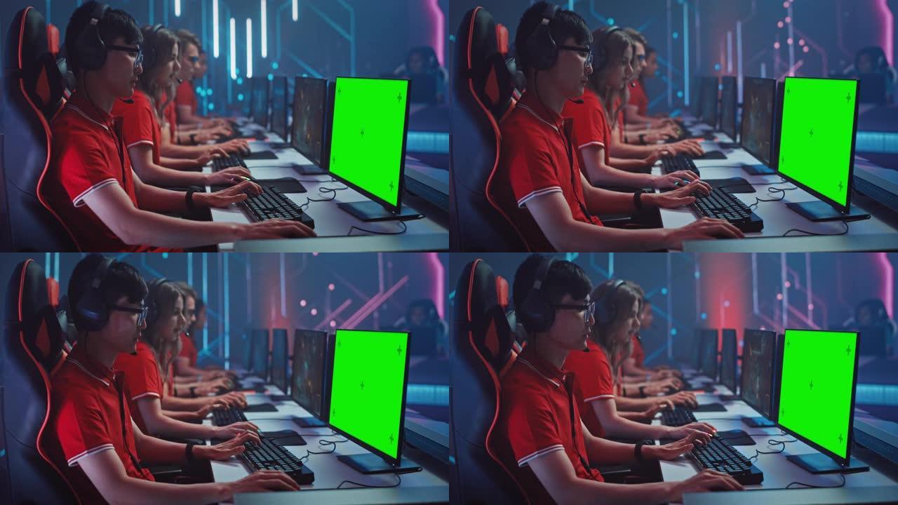 专业玩家在电子游戏中玩游戏，并在锦标赛上显示模拟绿屏。时尚霓虹灯网络游戏竞技场的职业玩家团队。锦标赛