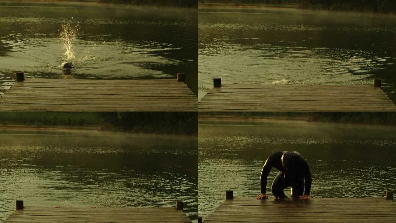 男子在湖中游泳极限冲浪水上运动员海上运动