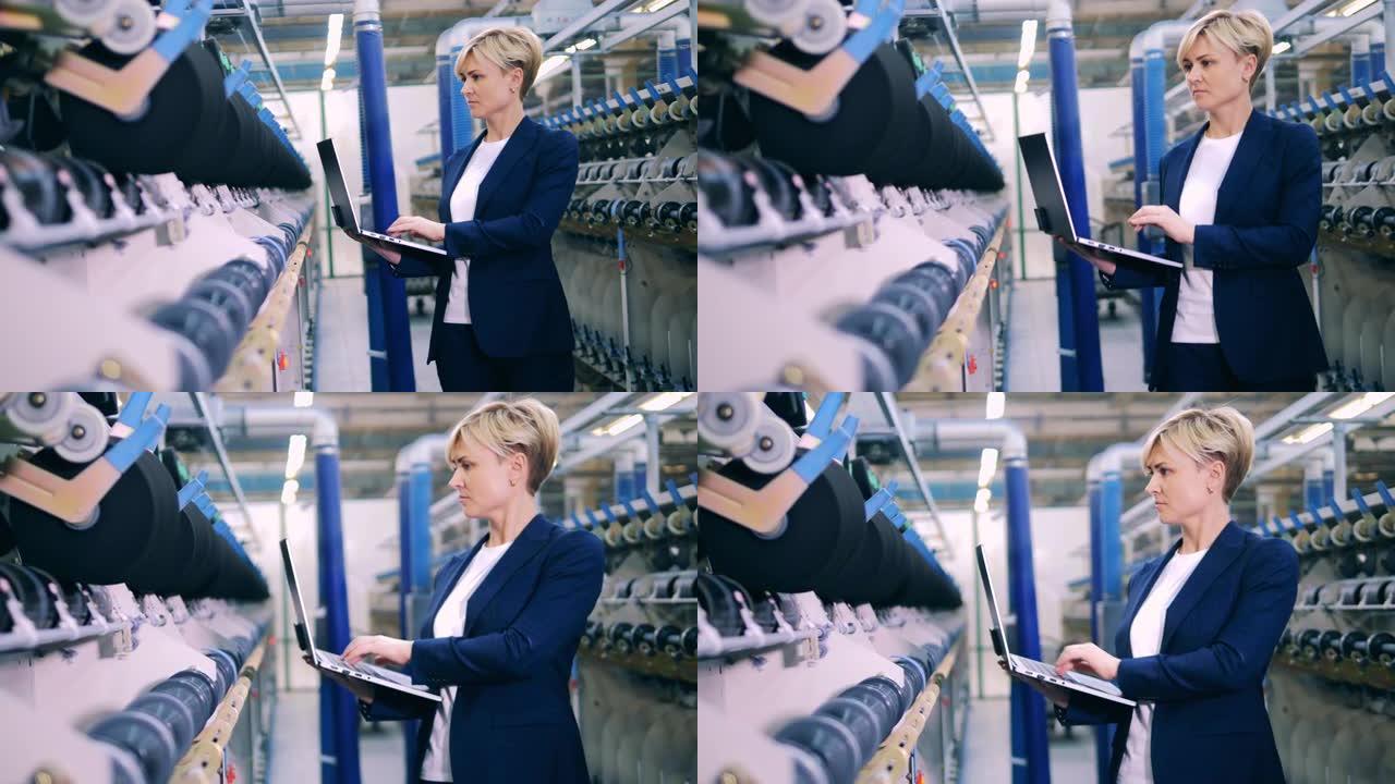 女专家正在工厂观察机械缝纫