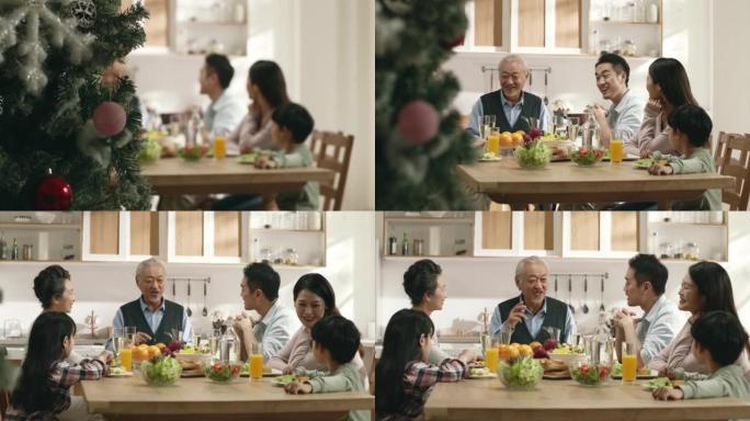 亚洲三代家庭在圣诞节在家用餐