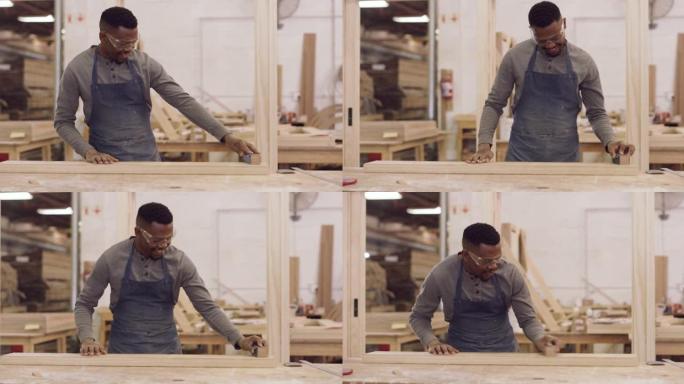 4k录像，一个在木工中工作的年轻人打磨了一块木头