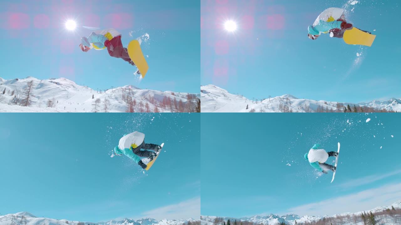 镜头耀斑: 单板滑雪运动员从踢球者跳下并进行旋转抓球的镜头。