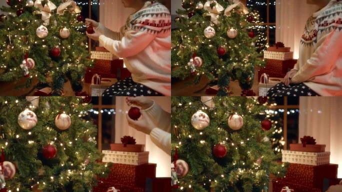 女人在家里装饰圣诞树