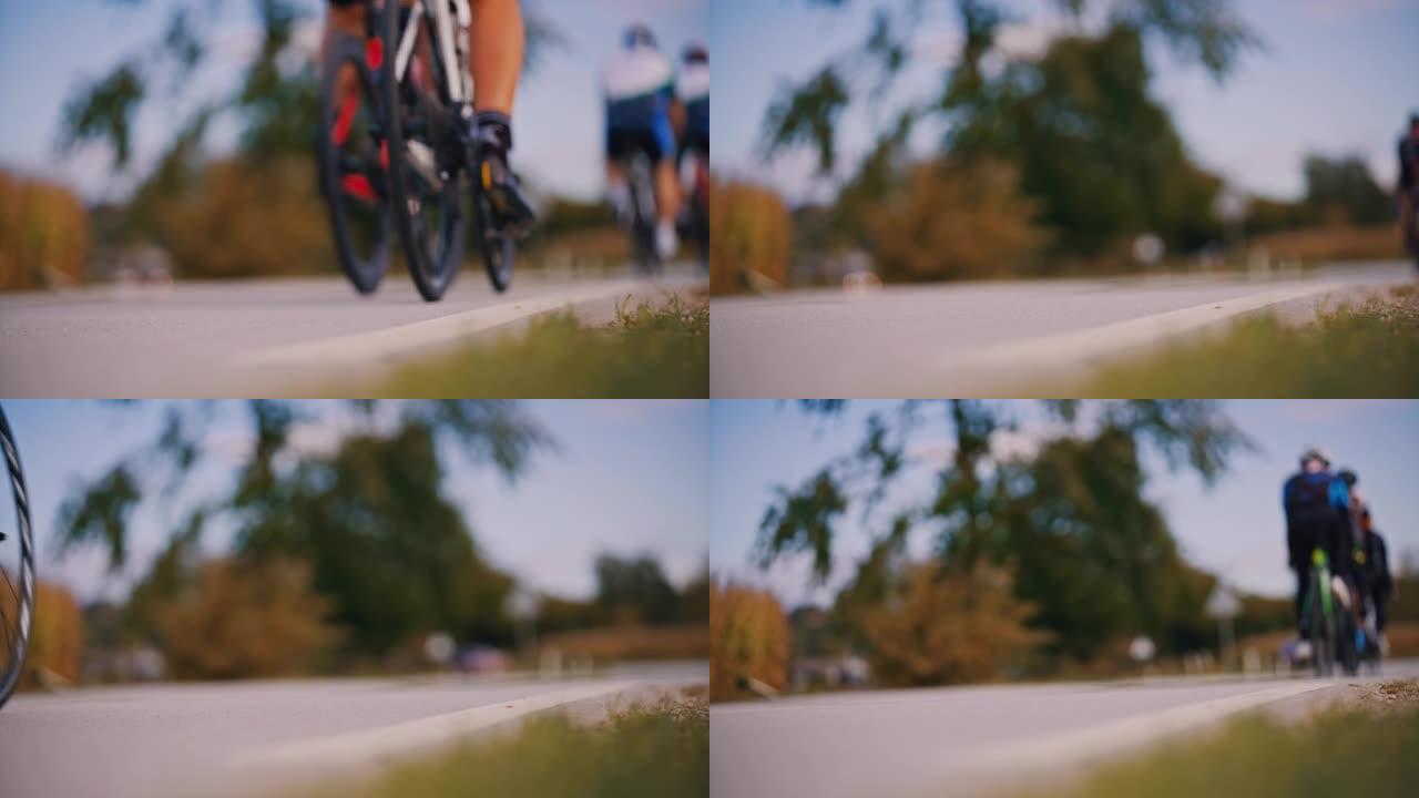 慢动作骑自行车的人在公路上赛车