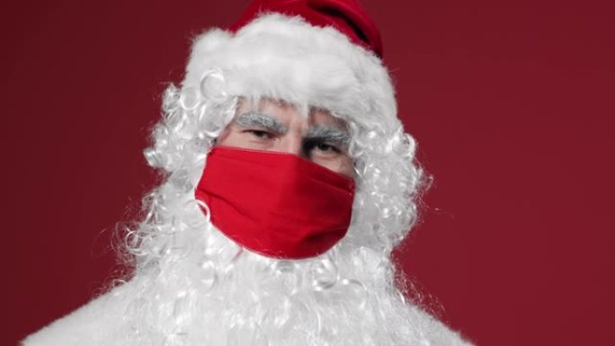 戴着防护面罩的圣诞老人肖像。