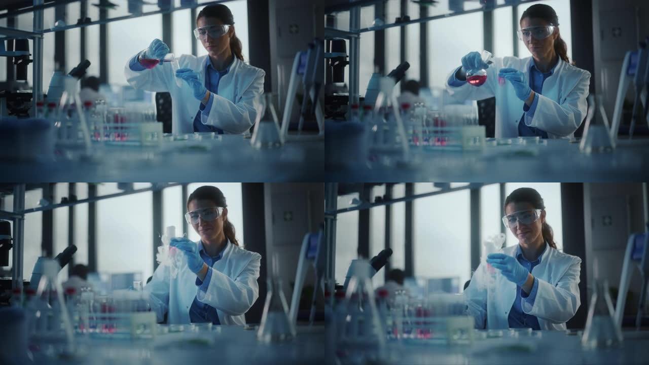 美丽的女科学家戴着护目镜，在实验室的试管中混合化学物质。年轻的专业微生物学家在现代实验室工作，拥有技