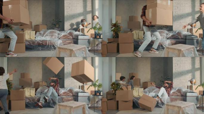一名男子背着大箱子，在新的宽敞轻便的公寓里移动，孩子们跑来跑去，摔倒在沙发上。