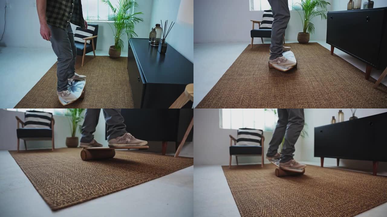 男人开始在平衡板上练习，躺在公寓内的地毯上