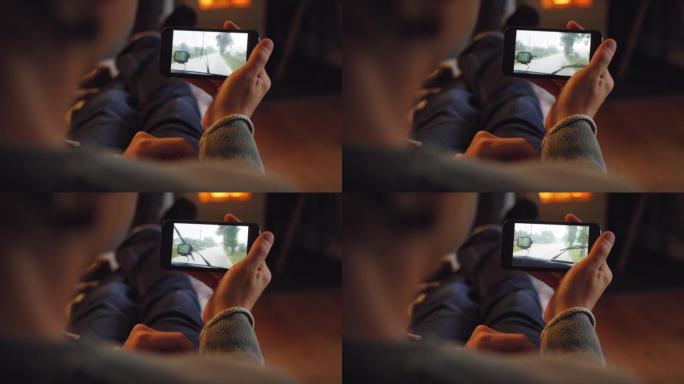 一名男子在家观看智能手机视频的4k视频片段