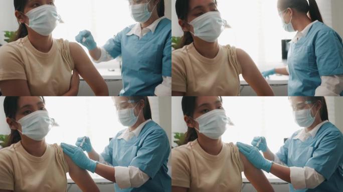 护士正在健康诊所给一名女性患者注射疫苗