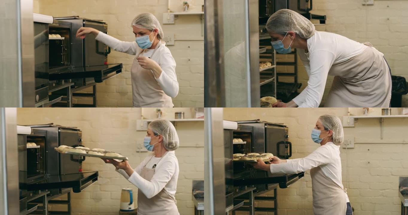 一个成熟的女性面包师在面包店准备百吉饼的4k录像